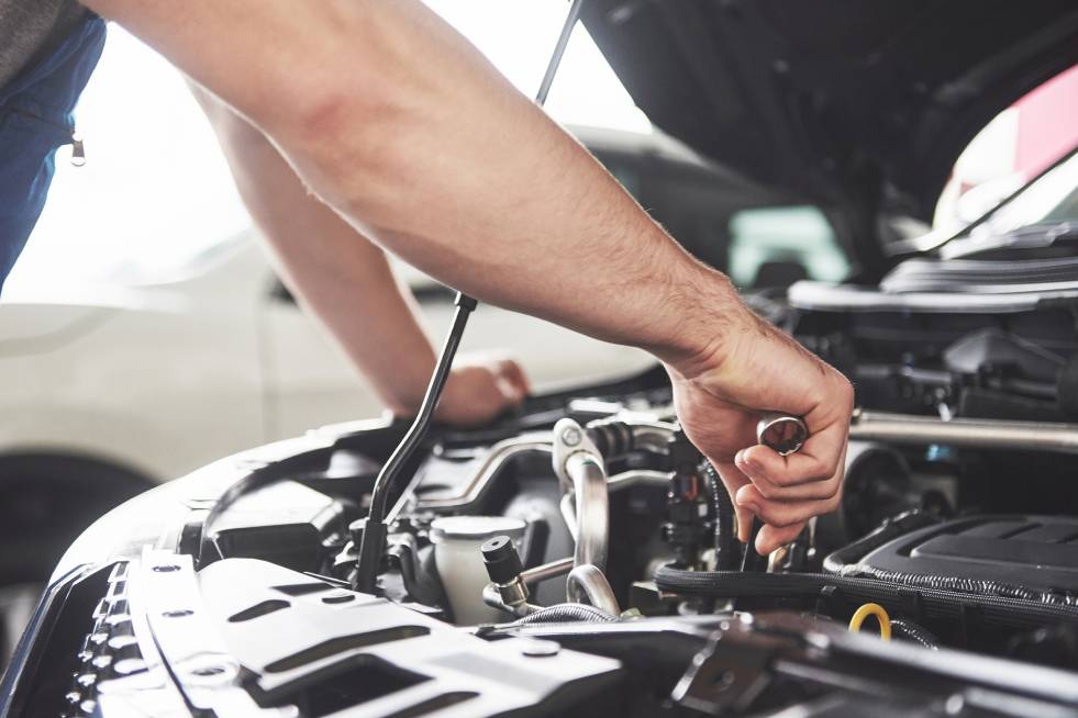 auto mechanic repairing a car