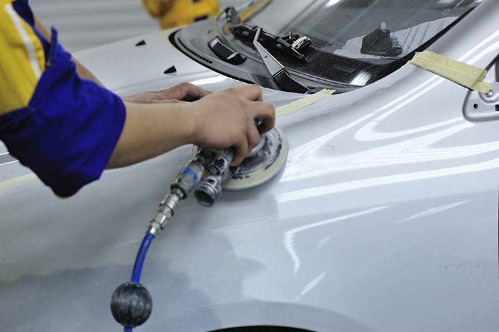 car body being polished