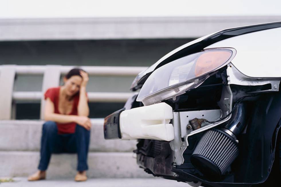 damage woman worried about car collision