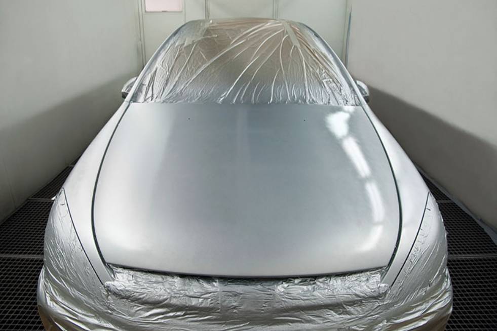 painted car car being painted